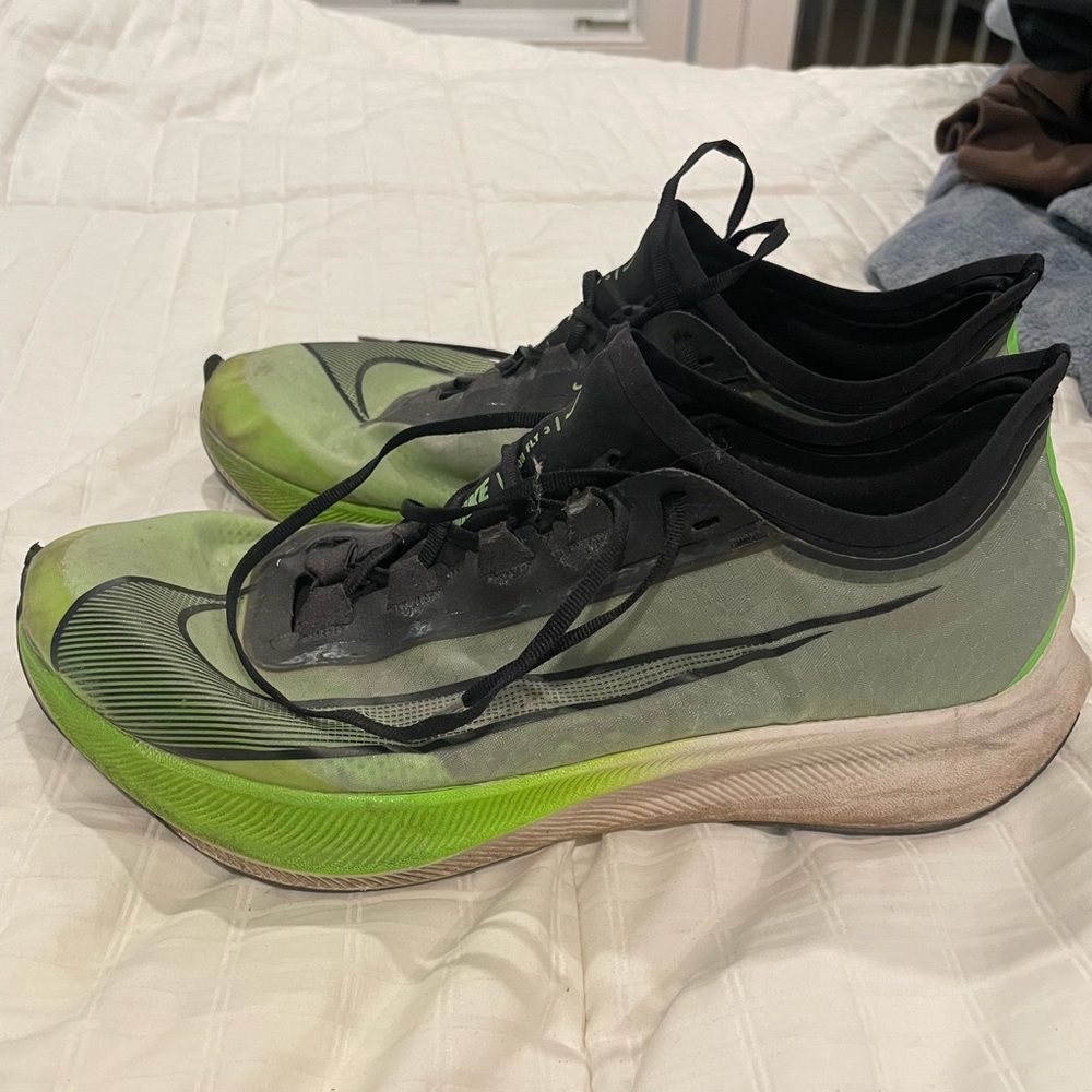 Neon green Nike running shoes size 12